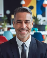 mature-smart-hispanic-businessman-smiling-face-standing-blur-background-creative-colorful-off_926199-4255722